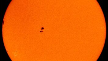 IN SPACE - NOVEMBER 18: In this handout photo provided by NASA, an MDI image shows giant sunspots 486 and 488, which caused intense space weather last month, and have been hiding on the far side November 18, 2003 on the sun. Sunpsot 488 is already visible and appears large. (Photo by NASA via Getty Images)