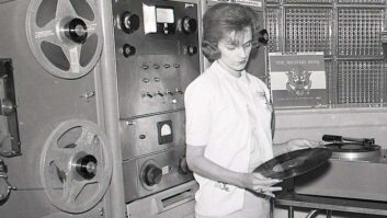 An IGM 200 “Simplimation” system is visible behind the woman holding an LP. This is at WDOD in Chattanooga, Tenn. in the early 1960s.