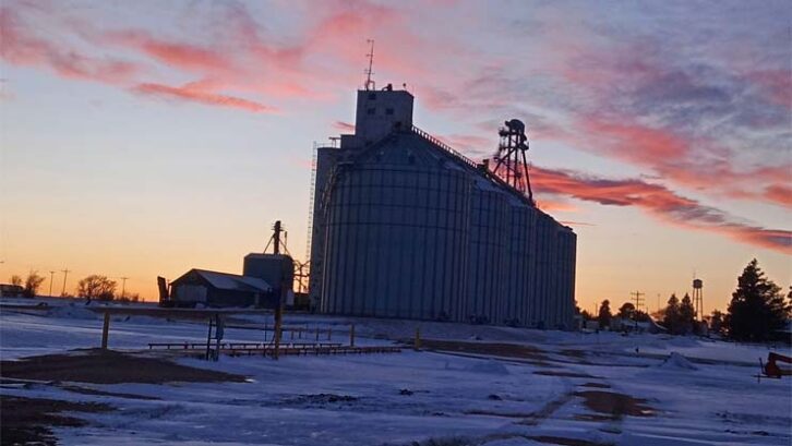 The transmitter site is at the base of a grain elevator.