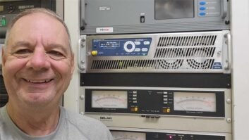 Hal Kneller with the new transmitter.