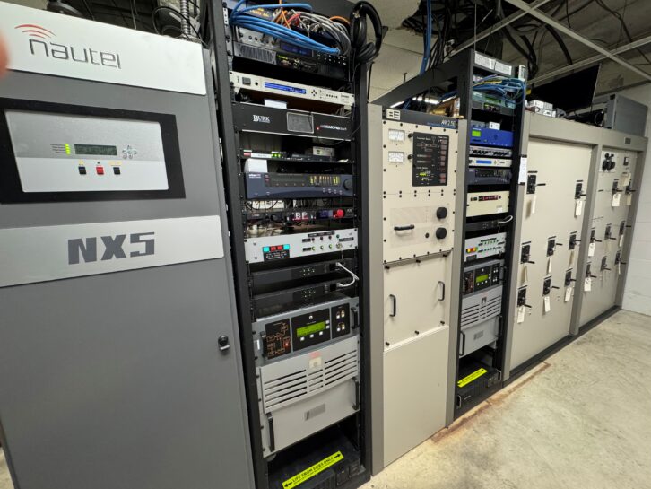 Inside the newly upgraded diplexed transmitter facility in Dupo, Ill. The overhauled room features modernized equipment to support both KFUO and KXFN, including a Nautel NX5 transmitter (left) and custom phasing and tuning cabinets (right) designed for the combined operation.