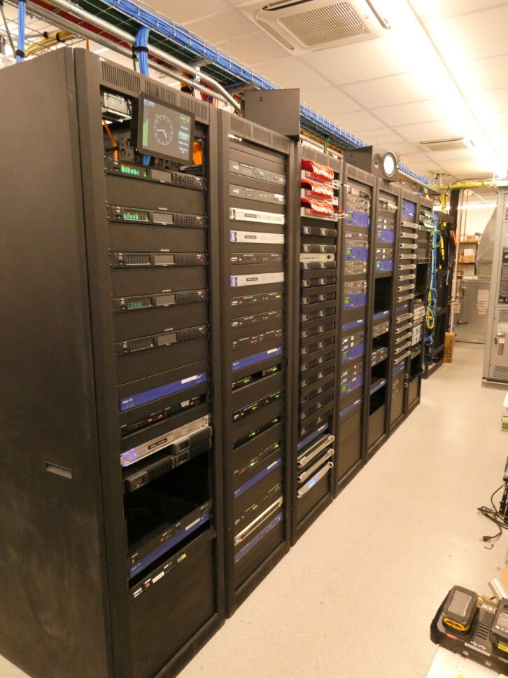 Another view of the TOC shows Tieline Gateways for IP STL delivery next to traditional satellite receivers and racks of xNodes.