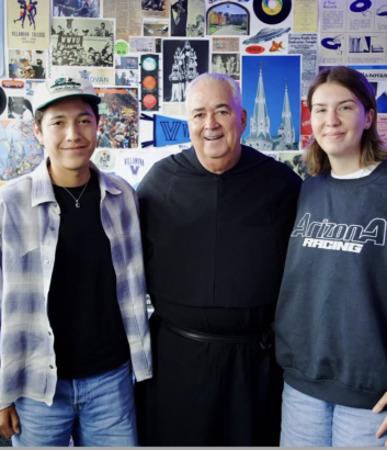 Ethan Silva, WXVU program director, and MK Coolican with Villanova University President Rev. Peter M. Donohue