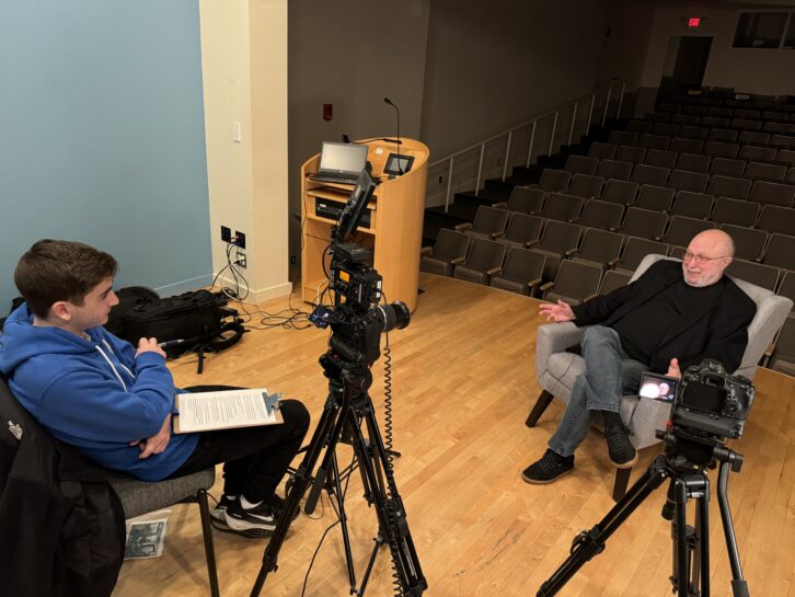 WKWZ Station Manager Jason Feldman (left) interviews former longtime faculty advisor Jack DeMasi, who supervised WKWZ for 26 years.