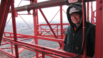 Davis atop a broadcast tower, circa 2011.