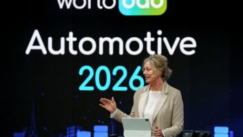 WorldDAB President Jacqueline Bierhorst speaks on stage at the WorldDAB Automotive event