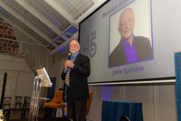 Jobie Sprinkle speaks at the 2026 Beacon Award presentation.