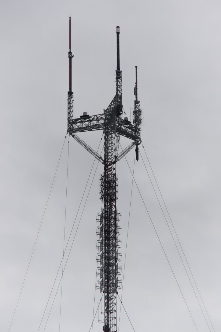 The top of the American Tower “Candelabra” at Roxborough, which was installed in 2002. The master FM panel is in view, as is the WRTI antenna on the right-hand tine. Credit: Courtesy Mike Littrell 