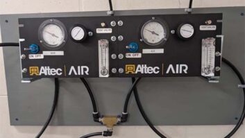 Fig. 2: Spray the manifold hose fittings while looking for small bubbles