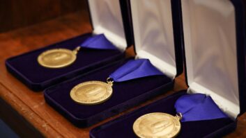 Alabama Broadcasters Hall of Fame medallions sit on a table