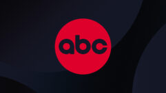 ABC logo in red circle on black