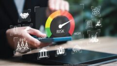 Stylized image of a person's hands working on a phone, with a "risk meter" image superimposed