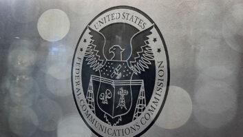 The seal of the Federal Communications Commission on an office door. (Al Drago/Bloomberg via Getty Images)