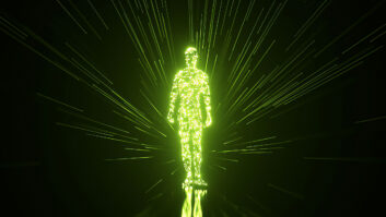 Green luminous particles coalesce to form a human silhouette, which stands while radiating brilliant light rays against a dark background, suggesting the power of people working with technology
