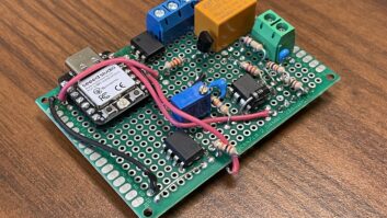A small electronics circuit board with components mounted.