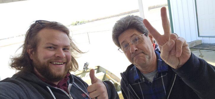 Neace with one of his mentors, Erik Coasta, after successfully restoring the transmitter during the Kentucky floods.