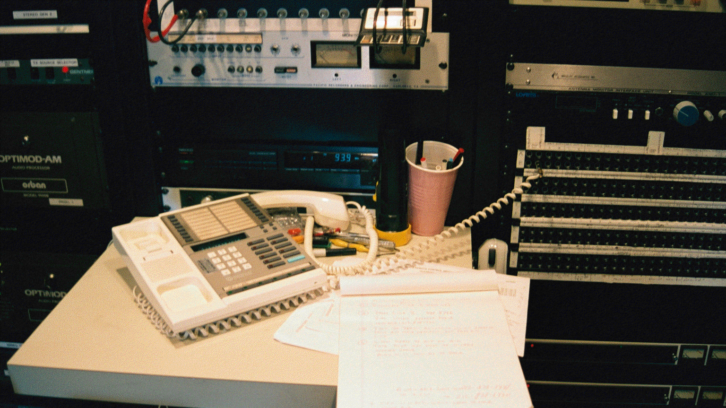 The "earpiece hack" setup at WNYC's Kearny, N.J., transmitter facility on Sept. 11. An unscrewed telephone earpiece was wired directly into the audio processor patch panel to get AM 820 back on the air overnight.