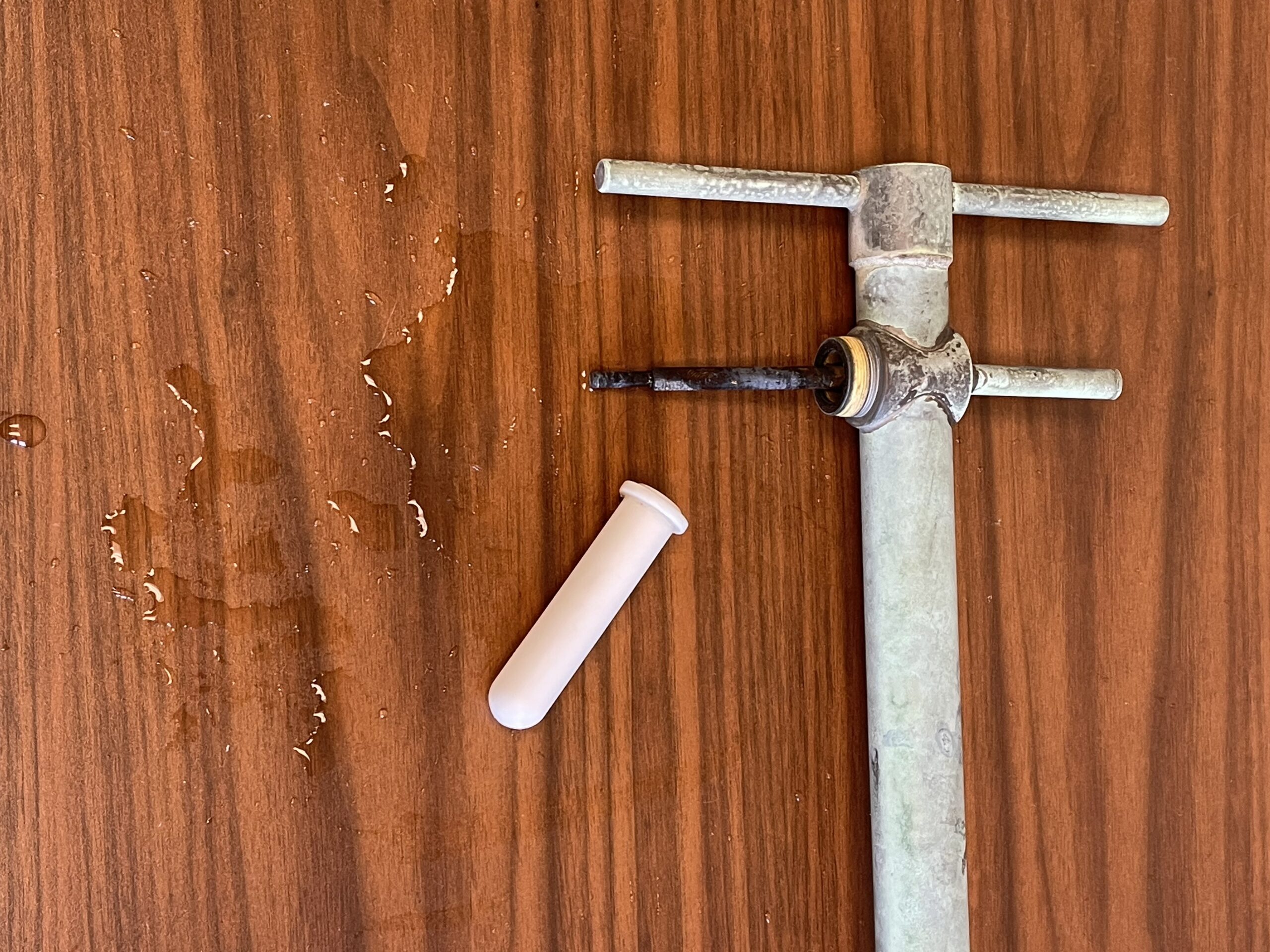 Water spilling out of the antenna after removing the plastic element cover.