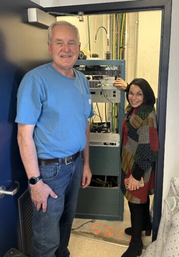 Engineer Mark Humphrey, left, with Dr. Carol Weingarten, at the WXVU(FM) transmitter rack.