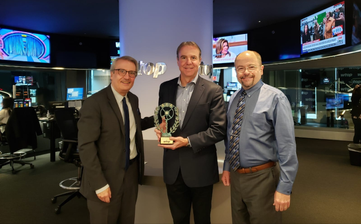 Joel Oxley, center, received the World Radio Day Award in 2020 from the American Academy of Radio, represented by Frank Montero, left, attorney with Fletcher, Heald & Hildreth, and Paul McLane, right, editor in chief of Radio World.