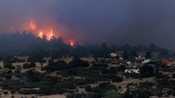 Fire is seen on a mountain ridge